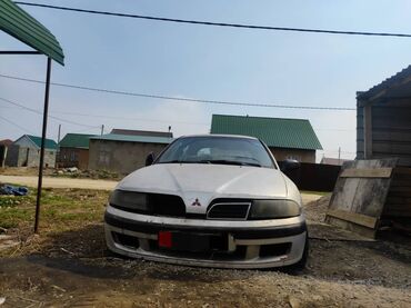 Транспорт: Mitsubishi Carisma: 1.8 л | 1999 г