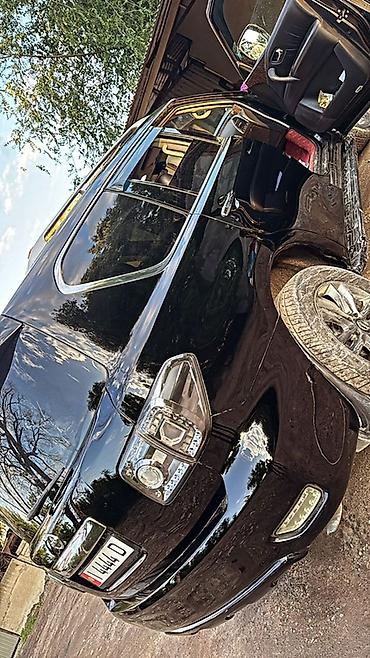 танден: Nissan Patrol: 2011 г., 5.6 л, Автомат, Газ, Внедорожник — 2
