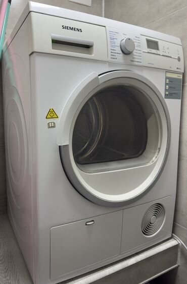Mətbəx texnikası: Siemens markalı bu ağ paltarqurudan maşın 8 kq tutuma malikdir və