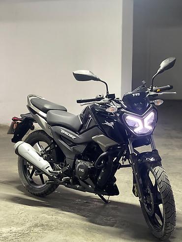 suret panel: TVS Raider motosikleti – şəhər və gündəlik sürüş üçün çevik və — 1