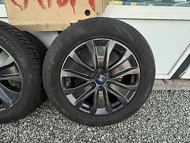 летние резина: Диск Ford с шиной - Оригинальный литой диск Ford, 10‑спицевый, под 5 — 1
