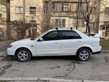 российский машины: Mazda Familia: 2001 г., 1.5 л, Автомат, Бензин, Седан