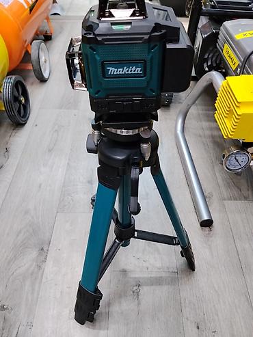лазерный уровин: Лазерный нивелир Makita на штативе - Профессиональный 360° лазерный — 1