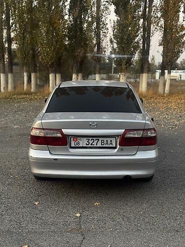 машины спорт: Mazda Capella: 2000 г., 2 л, Автомат, Бензин, Седан — 5