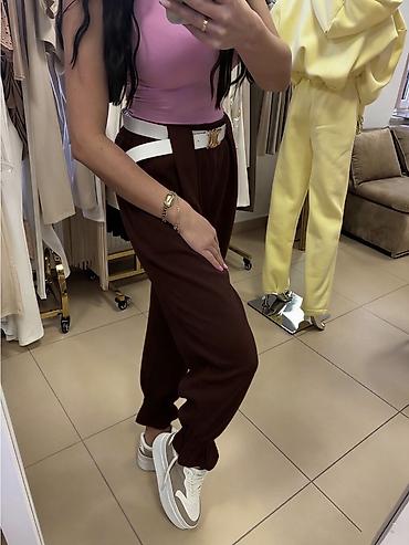 Pantalone: ✅Ženske široke pantalone sa karnerima na nogavicama i kaišem
✅2400 din — 5