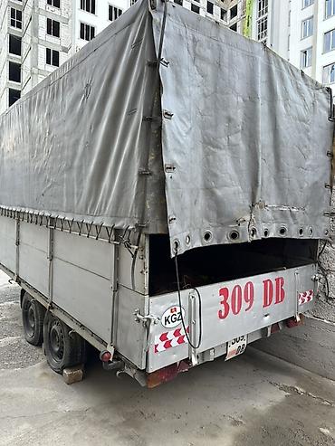 w210 55: Прицеп-тентованный двухосный, грузоподъёмность до 2,5 т. Длина 3.5.м — 1