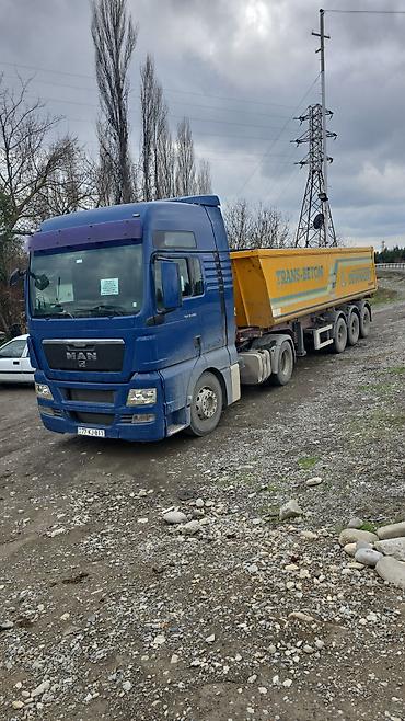 205 70 15: MAN TGA 4x2 traktor + SCHMITZ üçoxlu yarımqoşqu (küpə/kuzov tipli — 1