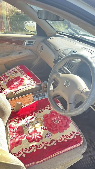 скутер suzuki: Nissan Sunny: 2004 г., 2 л, Автомат, Бензин, Седан — 3