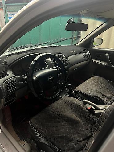 мазду 323: Mazda 323: 2002 г., 1.6 л, Механика, Бензин, Хэтчбэк — 2