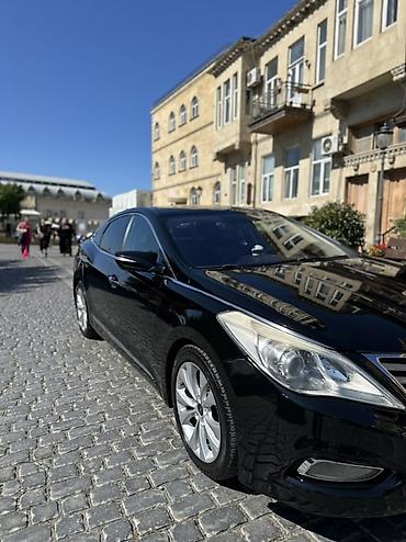 Hyundai: Hyundai Azera – biznes sinfi sedan Xüsusiyyətlər: - Korpusu: 4 qapılı — 4