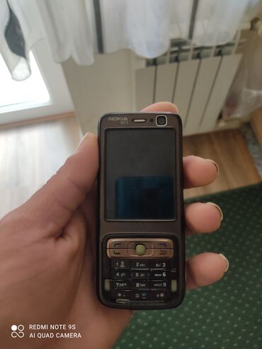 телефон fly включение: Nokia N73, цвет - Коричневый, Кнопочный
