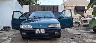 naxcivan masin elanlari 075: Daewoo Espero sedan - Kuzov: sedan, tünd yaşıl rəng - Ön və arxa işıq