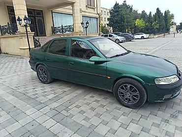 kredit avtomobil: Opel Vectra sedan – tünd yaşıl rəng, 4 qapı, 5 yerlik. Şəhər və tras — 2