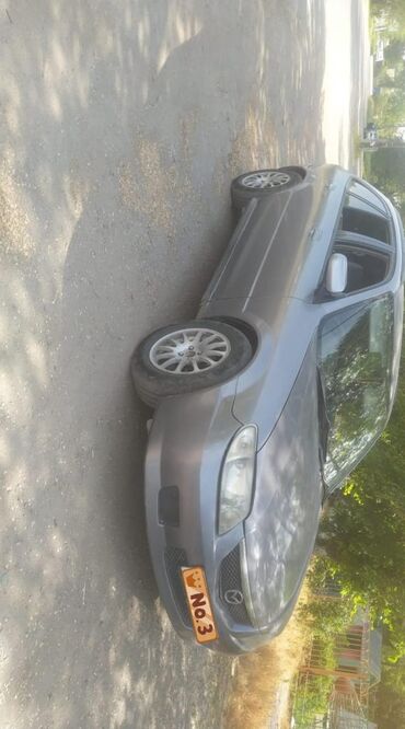 Mazda: Mazda Familia: 2002 г., 1.6 л, Автомат, Бензин, Хэтчбэк