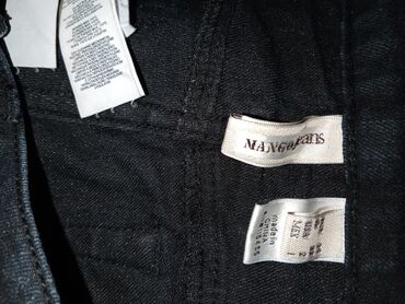 Farmerke: Mango jeans crne farmerke
 Veličina 34
kratko nošene
Cena 800 din — 9