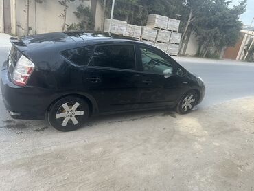 ilkin odenisiz masinlar: Toyota Prius: 1.5 l | 2007 il