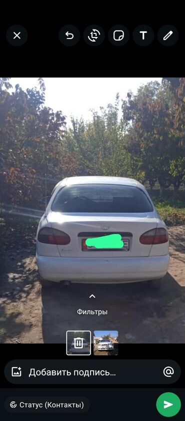 вета машина: Белый седан Daewoo Lanos с четырьмя дверями, представляющий собой