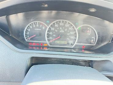 Kia: Kia Carens: 2005 г., Минивэн — 7