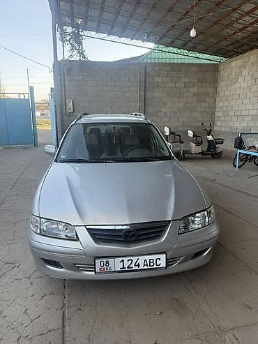 q 7: Mazda 626: 2001 г., 2 л, Механика, Бензин, Универсал — 1