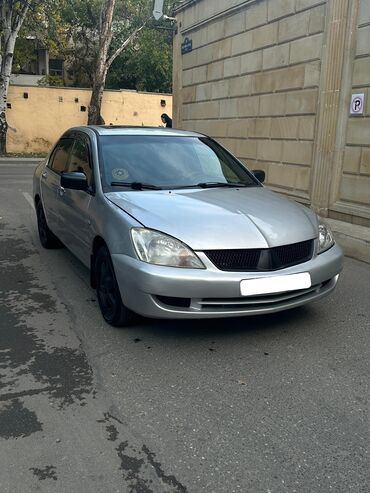 Mitsubishi: Mitsubishi Lancer: 1.6 l | 2006 il 338000 km Sedan