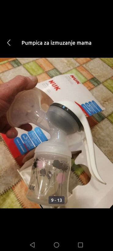 Ostale dečije stvari: Pumpica Nuk rucna za izmuzanje mama dojilja kao nova je 
 Mirjevo — 9