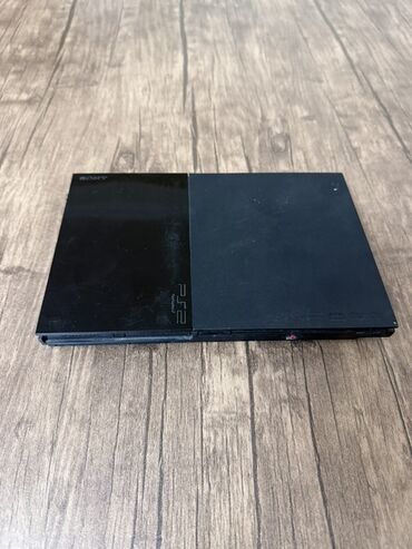 1 ci mikrorayon evlərin qiyməti: Sony PlayStation 2 konsolu, əyləncə və oyun üçün nəzərdə tutulmuşdur