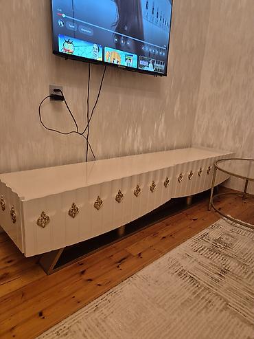 Mdf masin boyasidir yaxsi veziyyetdedir Tvstend tecili satildigi ucun