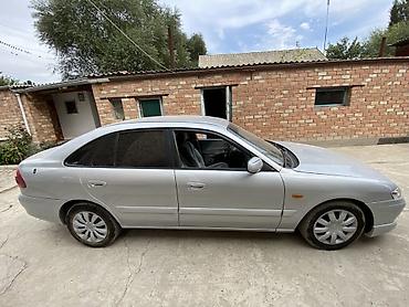 аморт одиссей: Mazda Capella: 2000 г., Механика, Бензин, Седан — 4
