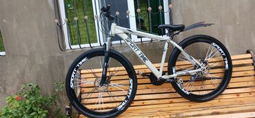 qiz ucun velosiped: Sport Time dağ velosipedi. BAKI ŞƏHƏRİNDƏDİR.AĞ RƏNG 340 aznya