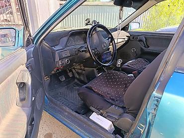 мазда 1991: Mazda 323: 1991 г., 1.6 л, Механика, Бензин — 2