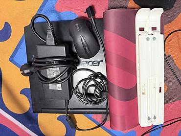 Ноутбуки Acer: Игровой ноутбук Acer в черном корпусе с красной подсветкой клавиатуры — 4