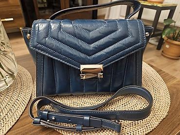 Çiyin çantası, Michael Kors, İşlənmiş