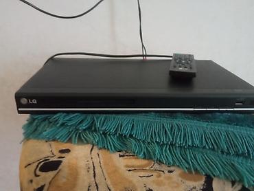 video pleyer: LG DVD pleyer + pult - Brend: LG - Tip: DVD pleyer (ön paneldə disk — 1