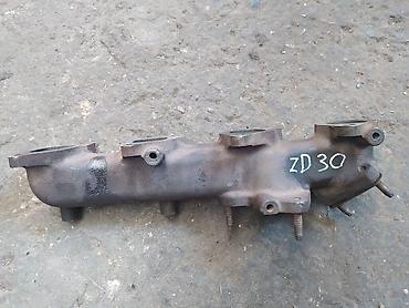 down pipe: Коллектор Nissan Б/у, Оригинал — 2