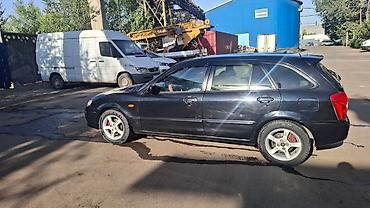 mazda 2000: Mazda 323: 2002 г., 1.6 л, Механика, Бензин, Универсал — 5