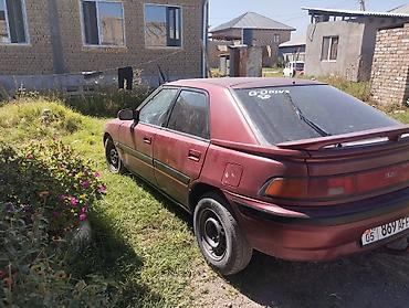 m57 купить: Mazda 323: 1993 г., 1.6 л, Механика, Бензин, Лифтбек — 4