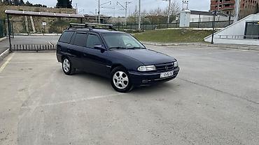 e39 rul: Opel Astra F Caravan (universa) – tünd mavi rəngdə, nömrə 10-RG-592 — 7