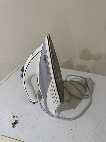 sonifer buxarlı ütü: Braun TexStyle 5 buxarlı ütü. Xüsusiyyətlər: - Güc: 2000 W - Buxar — 1