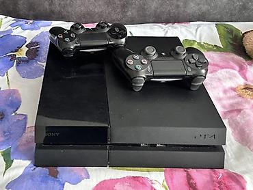 xbox приставка: Игровая консоль Sony PlayStation 4 (PS4) с двумя геймпадами DualShock — 1