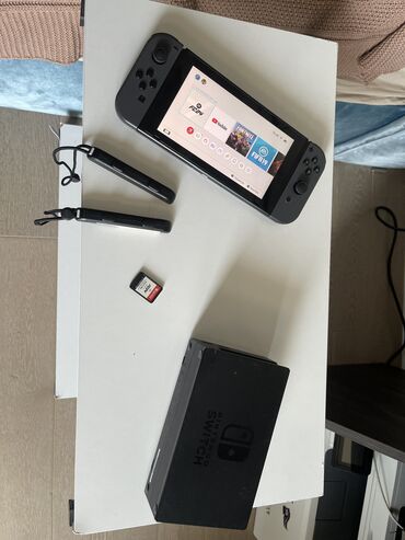 Nintendo switch + fifa 24 zeradka yoxdu 299azn