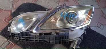 Щитки приборов: Передняя левая фара Lexus