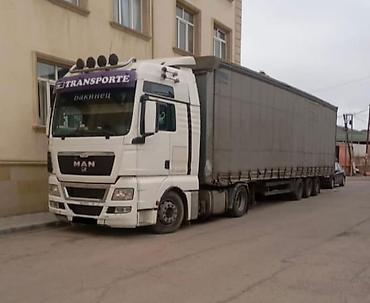 mercedes 208 d: MAN TGX dartqı avtomobili və tentli yarımqoşqu - Markа/model: MAN TGX — 2