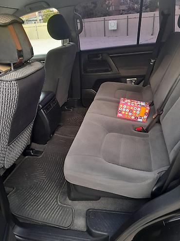 Транспорт ижарасы: Toyota Land Cruiser 200, черный внедорожник Условия: 7000 сом в сутки — 2
