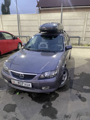 Mazda: Mazda 323: 2003 г., 1.6 л, Механика, Бензин, Хэтчбэк