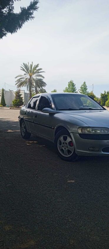 3 tekerli motosiklet benzinli: Opel Vectra: 0.2 l | 1999 il Sedan