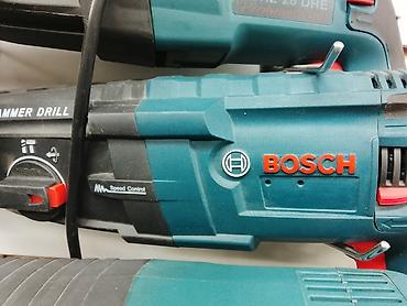 Электр шаймандары: Ударная дрель Bosch. Особенности: - Режимы работы: сверление и — 1