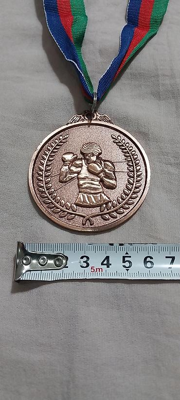 İdman kubokları və medalları: Boks medal dəsti - Rənglər: qızıl, gümüş, bürünc - Dizayn: Hər iki — 14