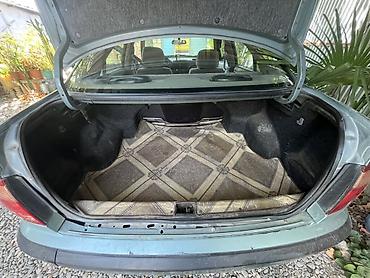 ford avtomobilleri: Nissan Sunny: 1.6 l | 2002 il Sedan — 5