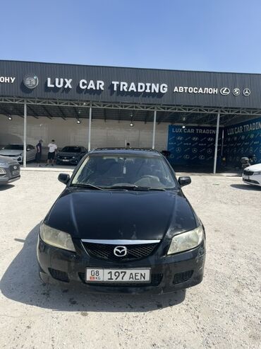 тюнинг мазда 323f слепая: Автомобиль Mazda Familia S-Wagon черного цвета. Вложения по кузову