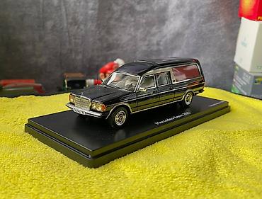 Avtomobil modelləri: Коллекционная модель Mercedes-Benz 200 W123 Hearse black 1982 Schuco — 13